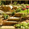 Landscaping installation, Minnetonka, MN – Perennial boarder bed with limestone outcroppings